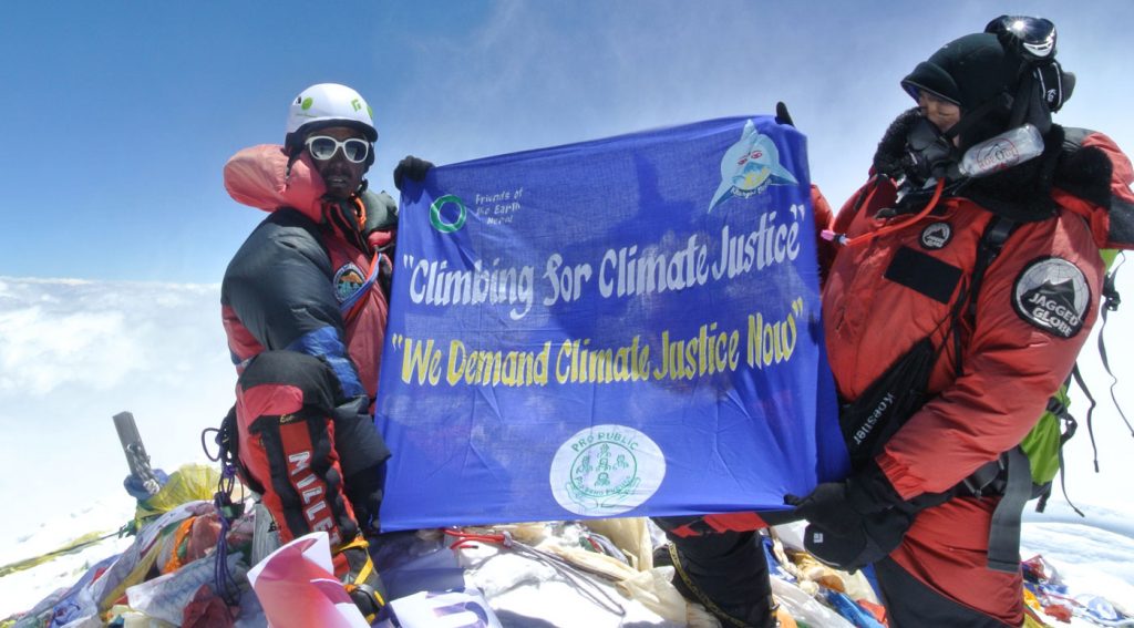 Climbers scale Everest to demand climate justice