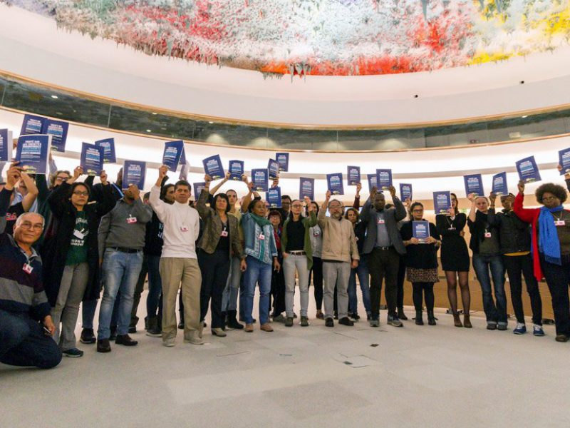 International activists pushing for the Binding Treaty in Geneva