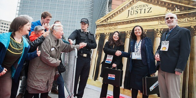 Media stunt protesting against a global corporate court