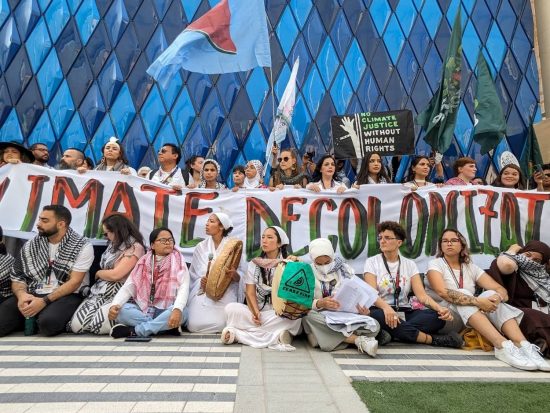 People protesting for climate decolonization at COP 28